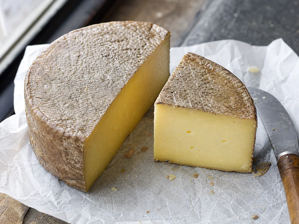 Washed rind and buttery cut paste on Aarewasser-style cheese - Aarewasser cheese | KnowTheCheese
