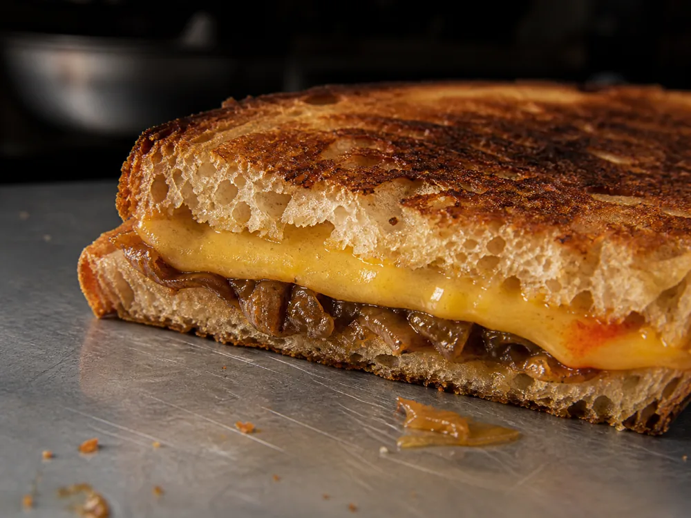 Toastie with a thin even layer of melted Applewood-style cheese - Applewood | KnowTheCheese