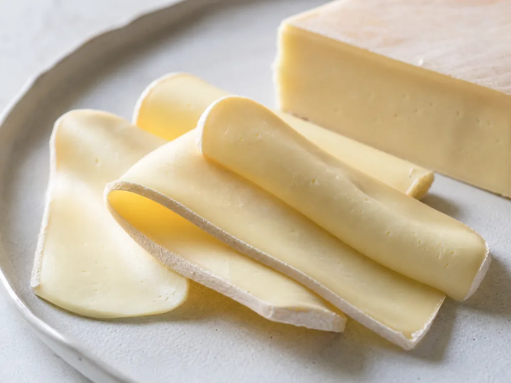 Flexible Bel Paese slices with smooth pale paste - Bel Paese cheese | KnowTheCheese