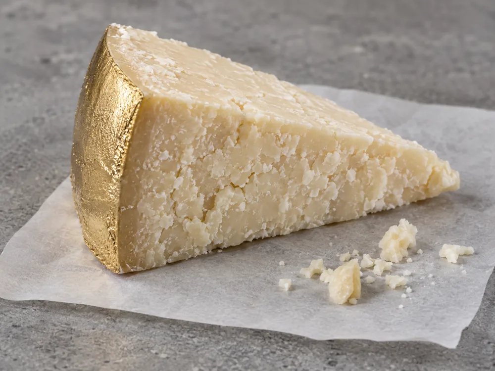 Gold-rind hard cheese wedge with crumbly granular paste - Bella Lodi cheese | KnowTheCheese