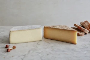 Young pale and aged ochre Bra style cheese wedges