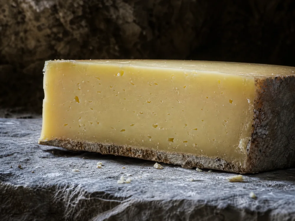 Firm pale paste and natural rind of an Alpine-style cheese - Butternut cheese | KnowTheCheese