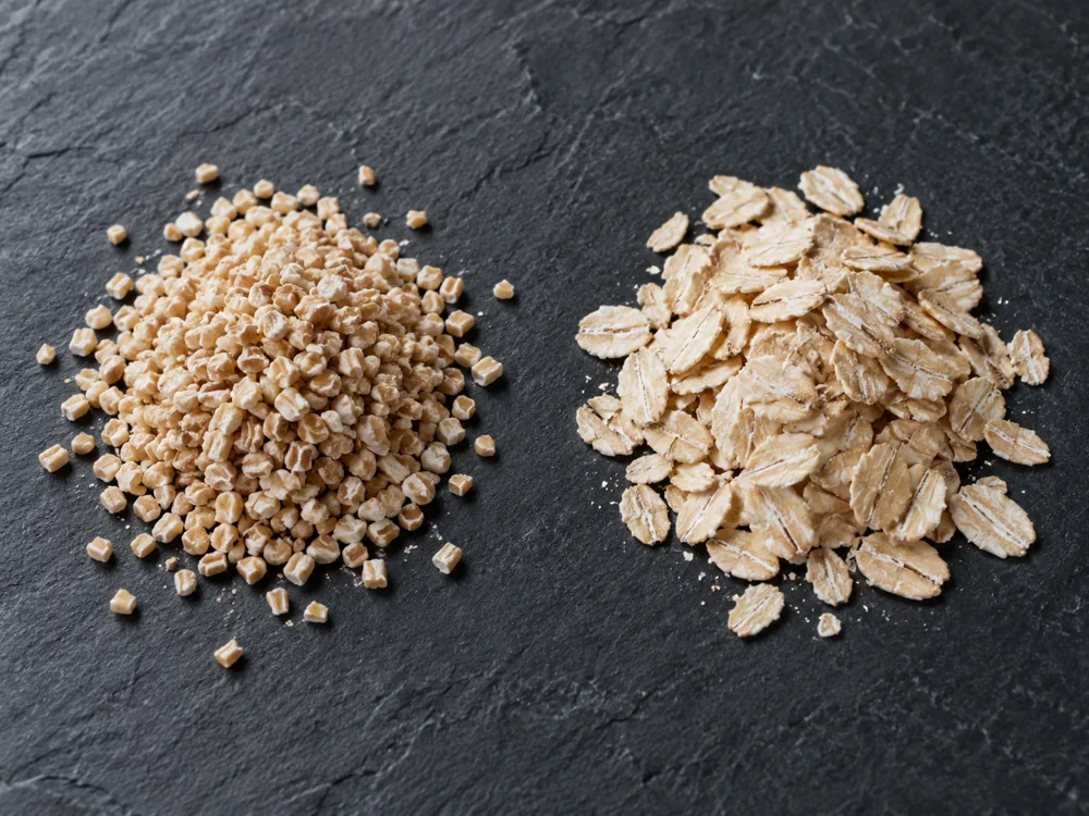 Pinhead oatmeal beside rolled oats on slate - Caboc | KnowTheCheese