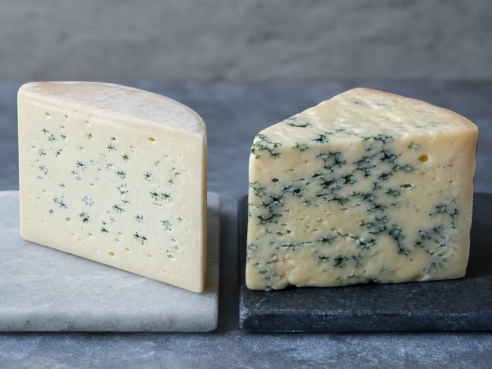 Young and mature Cashel Blue-style wedges showing texture and veining changes | KnowTheCheese