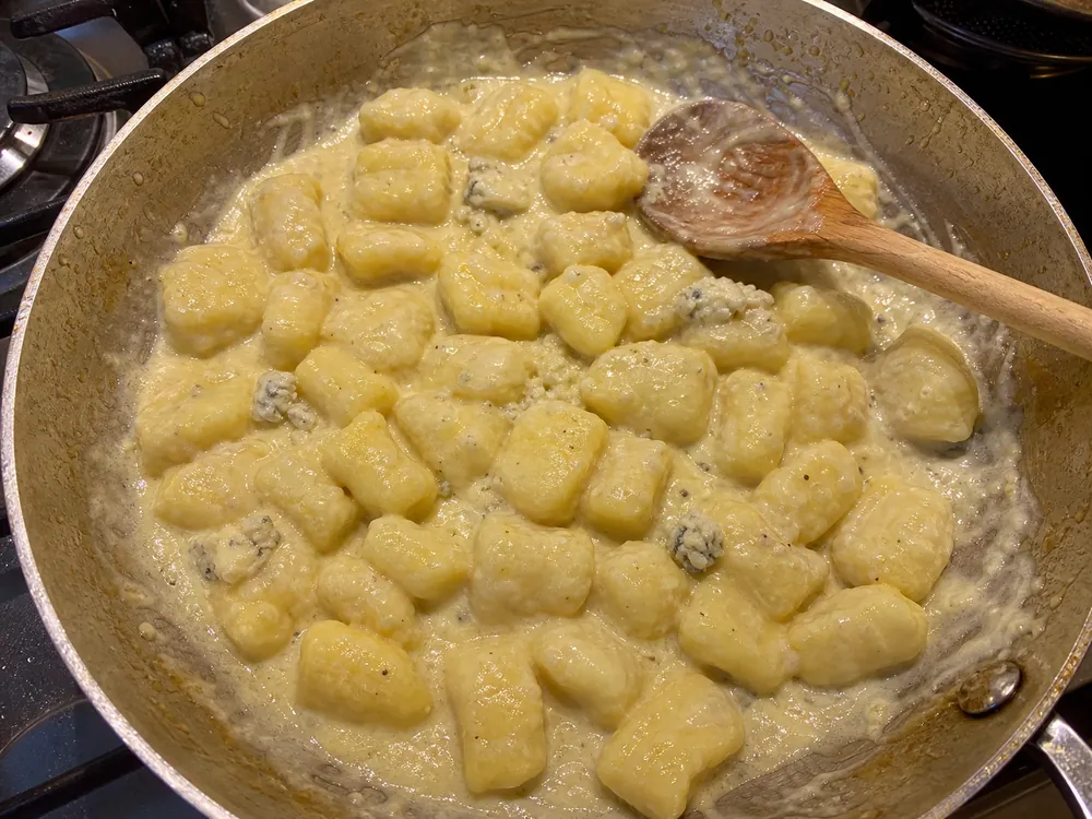 Potato gnocchi coated in a pale Castelmagno-style cheese sauce | KnowTheCheese