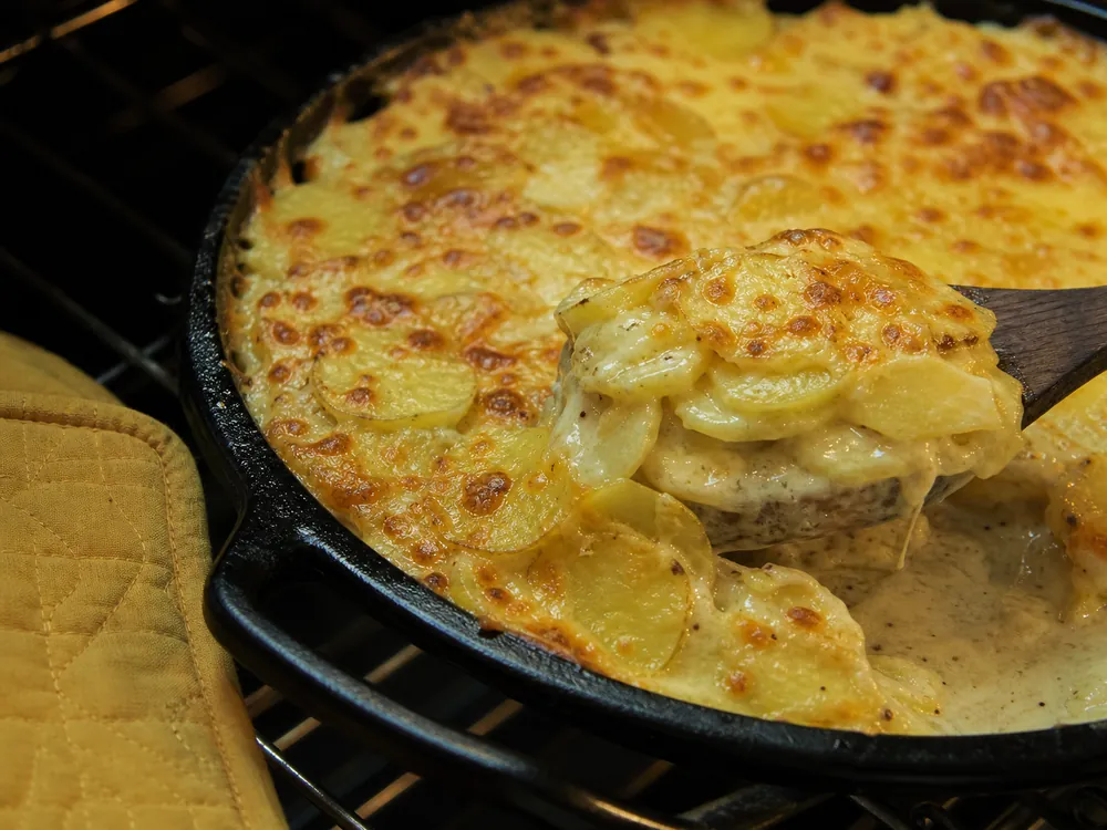 Potato gratin browned with aged Swiss cheese | KnowTheCheese