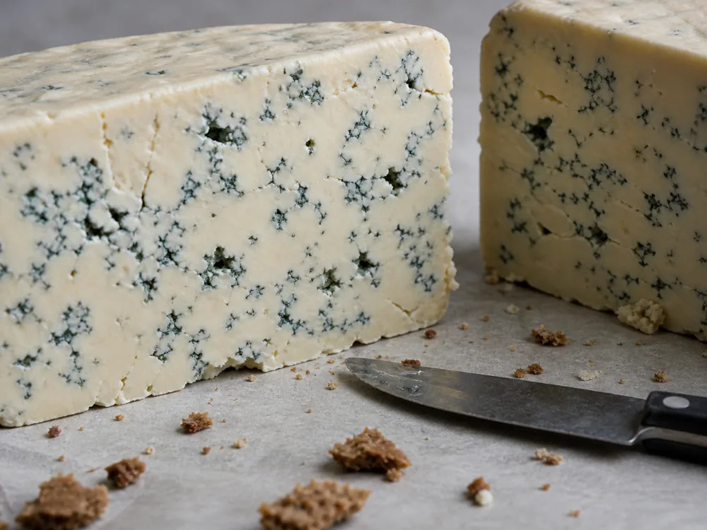 Dorblu cheese cut blocks with dense paste and blue veins - Dorblu | KnowTheCheese