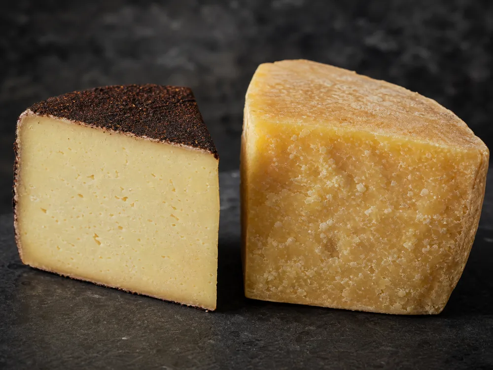 Dry Jack wedge beside a Parmigiano-Reggiano wedge for comparison - Dry Jack cheese | KnowTheCheese