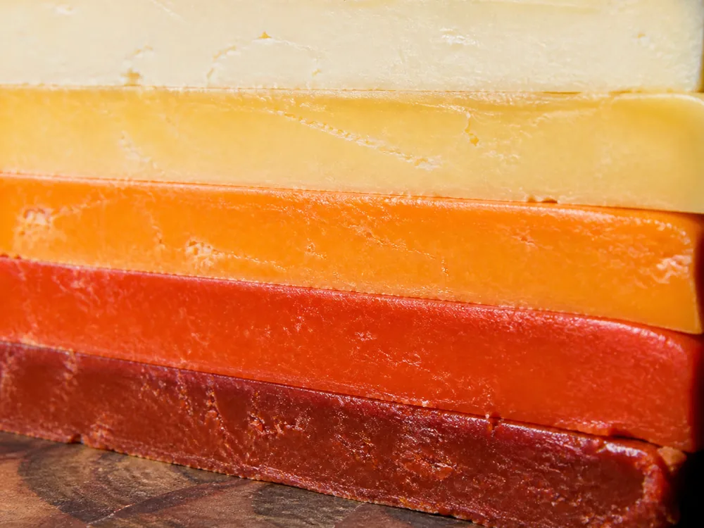 Close-up cross-section of the striped layers in Five Counties cheese - Five Counties cheese | KnowTheCheese