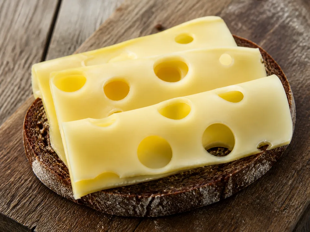Slice of Greve cheese on an open-faced sandwich - Greve cheese | KnowTheCheese