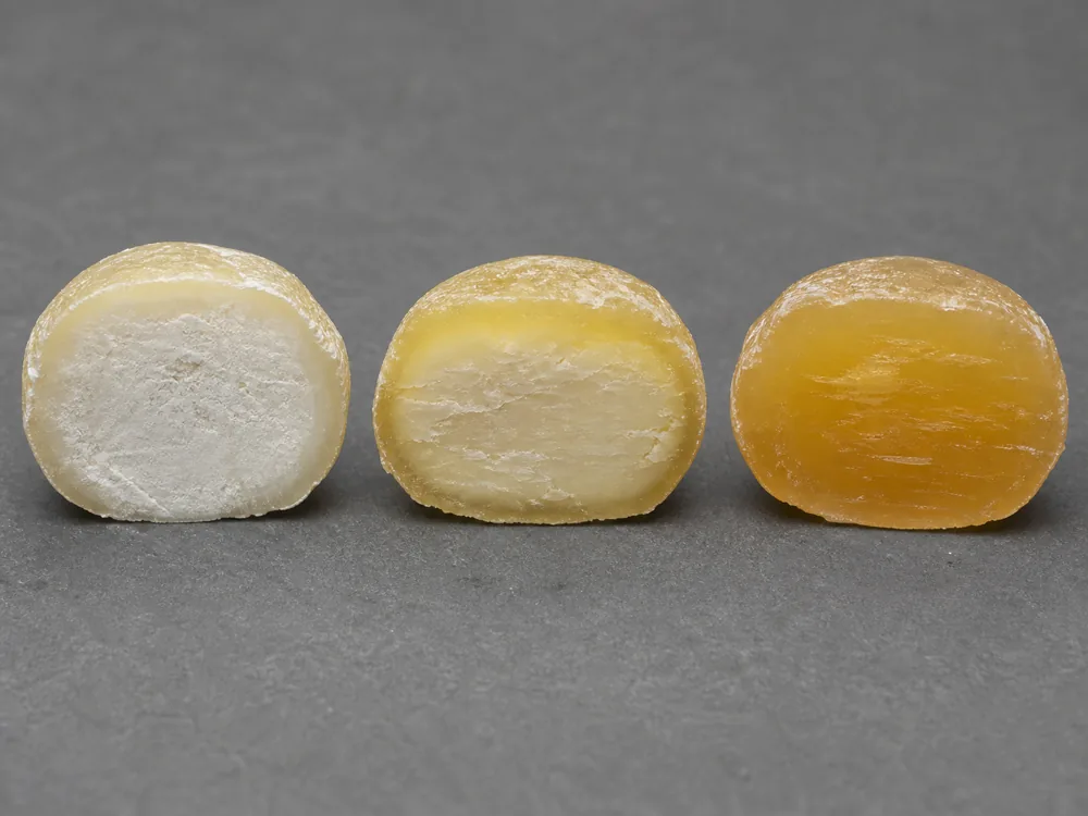 Three cut Harzer rounds from white-cored to fully ripened - Harzer cheese | KnowTheCheese