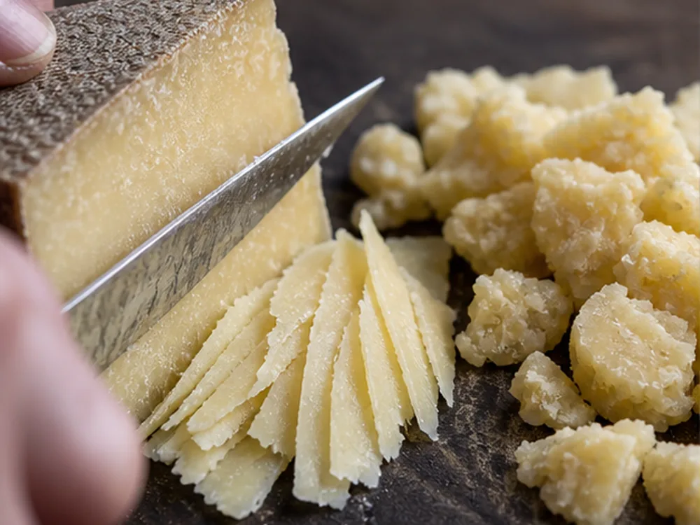 Isle of Mull cheddar cut into thin shards and chunky crumbles - Isle of Mull cheese | KnowTheCheese