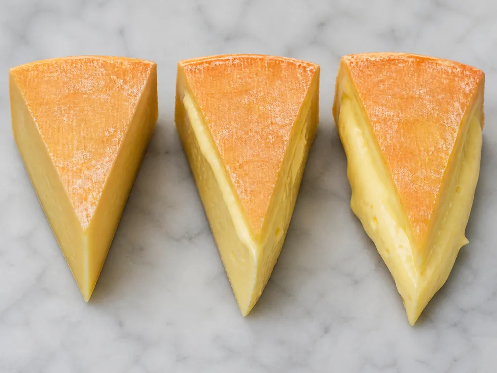 Ripening gradient from firm center to soft edge in washed-rind cheese - Keltic Gold | KnowTheCheese
