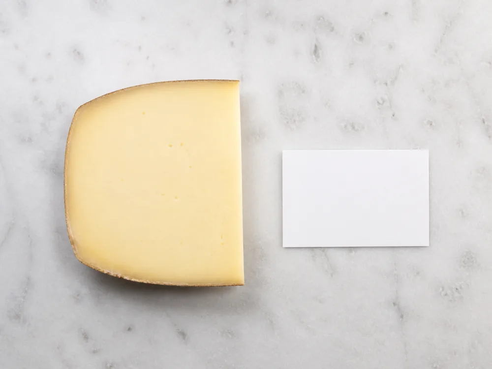 Clean pale cut face and intact edge on a Lamb Chopper wedge - Lamb Chopper | KnowTheCheese