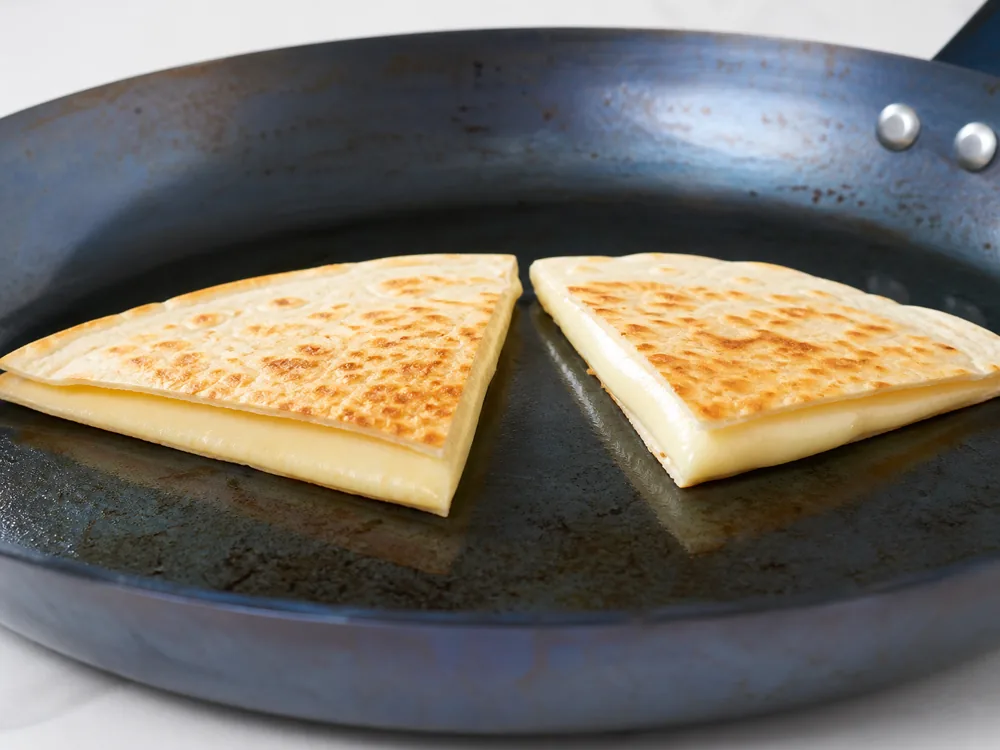 Monterey Jack melted evenly inside a skillet quesadilla - Monterey Jack | KnowTheCheese