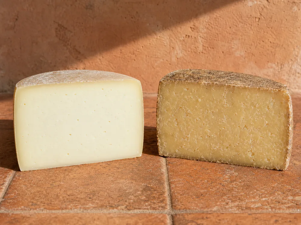 Young and aged Pecorino Toscano wedges compared side by side - Pecorino Toscano | KnowTheCheese
