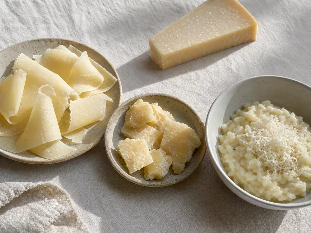 Sbrinz served as curled rebibes, broken chunks, and grated cheese - Sbrinz | KnowTheCheese