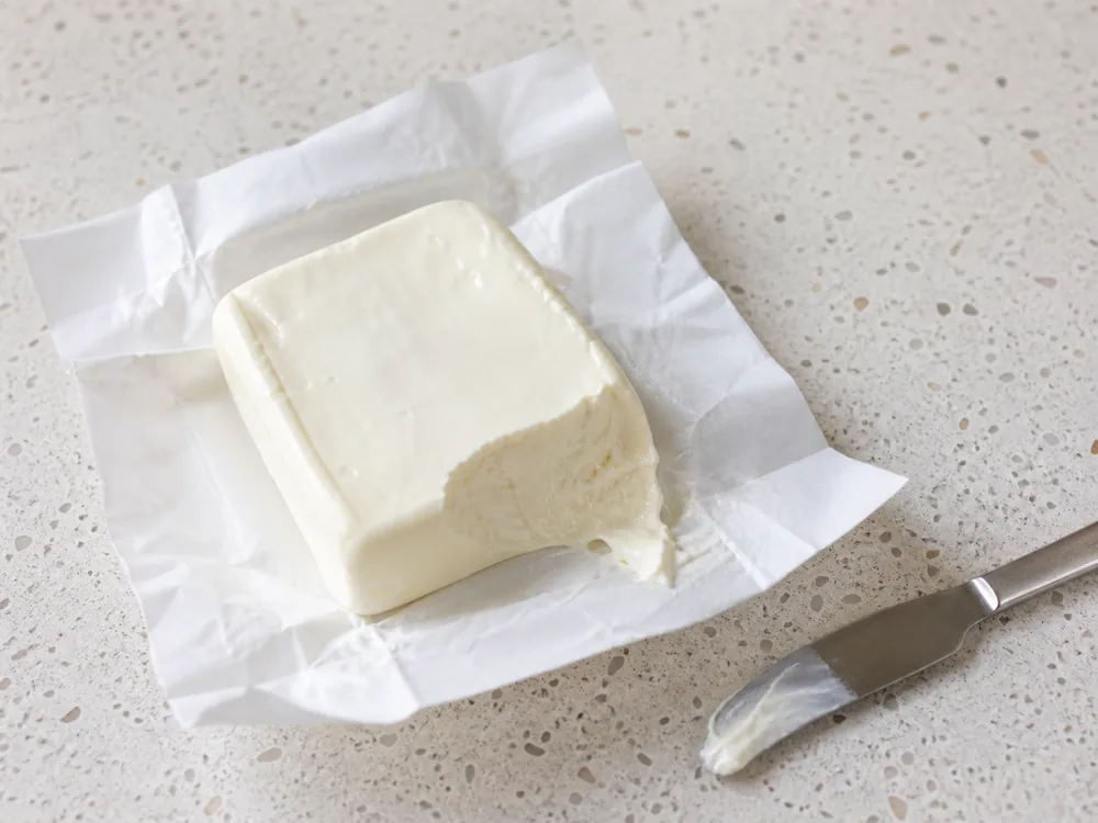 Small fresh Stracchino with a moist smooth paste and softly relaxed edge - Stracchino | KnowTheCheese
