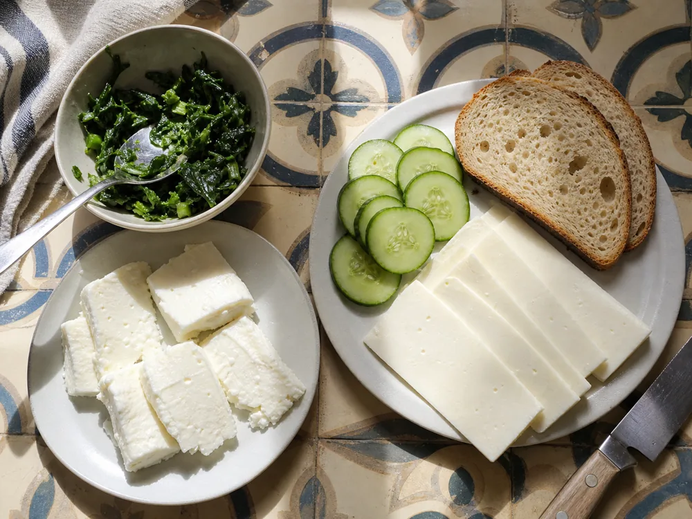 Thick Teleme pieces for pastry beside thin slices for a sandwich