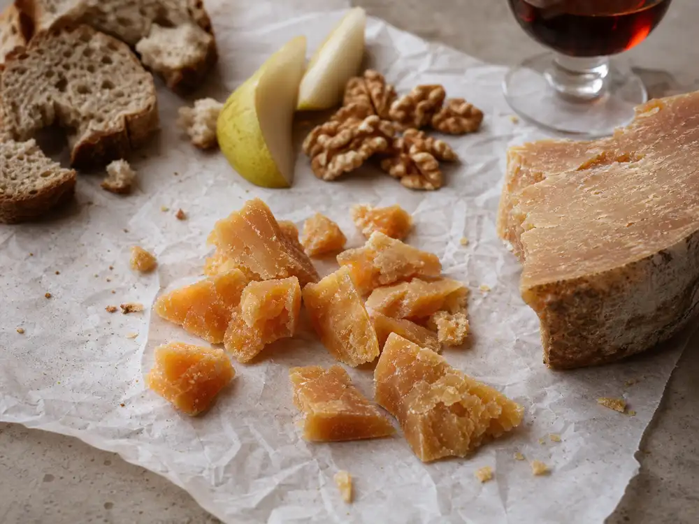 Four year aged farmhouse cheese shards with pear walnuts bread and port - Unpasteurised Farmhouse 4 Year Old | KnowTheCheese
