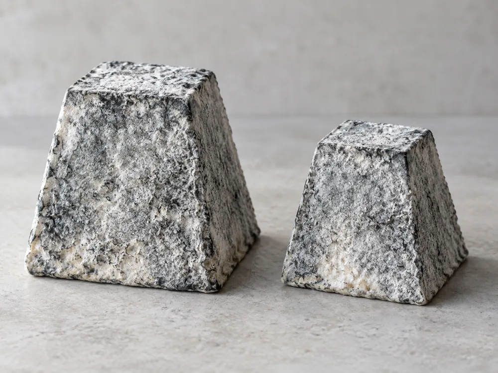 Large and small truncated Valencay pyramids side by side - Valencay | KnowTheCheese